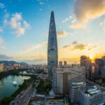 Stunning view of Seoul's skyline featuring Lotte World Tower at sunset.