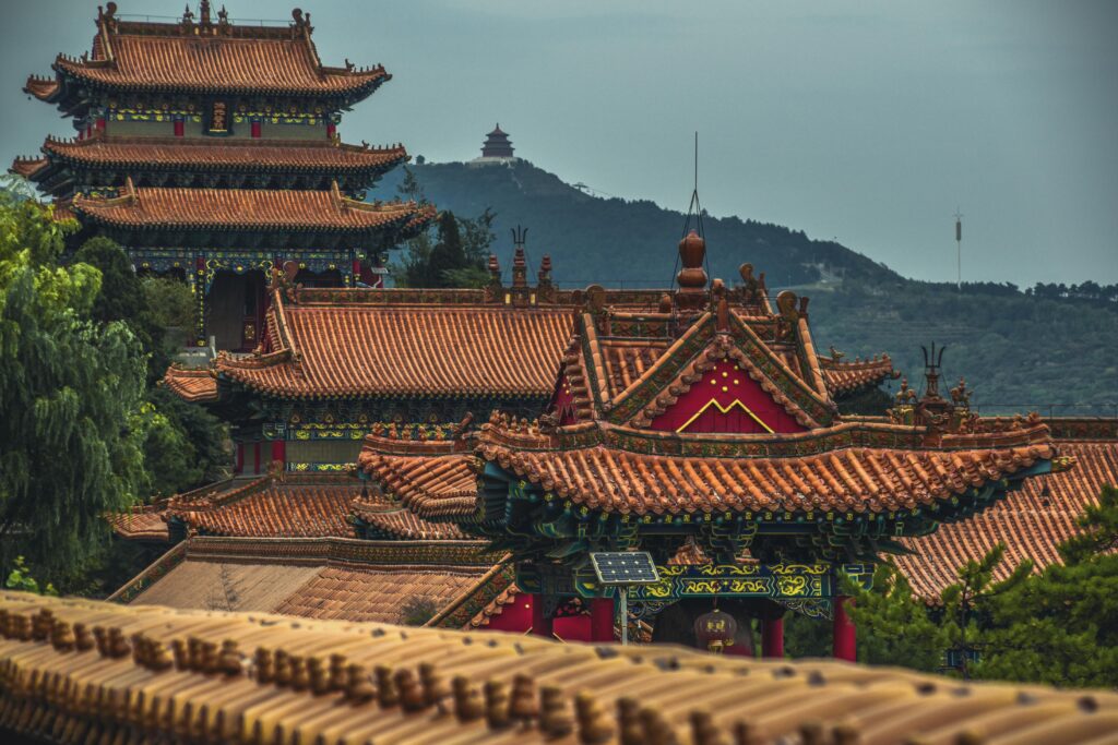 pexels photo 2915957 2915957 Explore the stunning ancient architecture of a Chinese pagoda in Shanxi, featuring intricate roofs and lush surroundings.