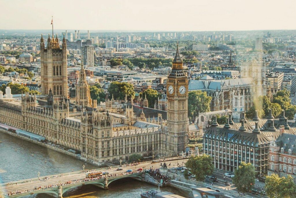 pexels photo 672532 672532 Stunning aerial view of London's iconic Big Ben and the river Thames under daylight.